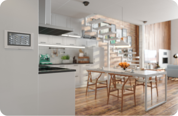 Home control panel beside a kitchen and dining area